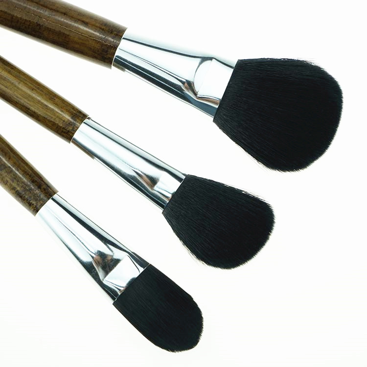 Natural wooden color handle brushes makeup with cowboy bag