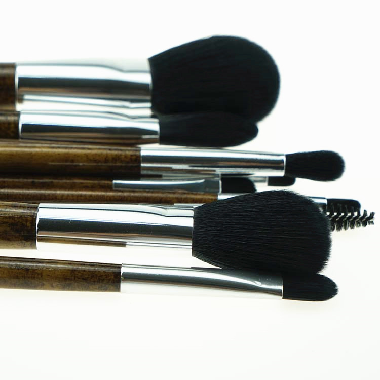 Natural wooden color handle brushes makeup with cowboy bag